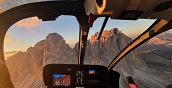 Interno cabina elicottero volo Dolomiti