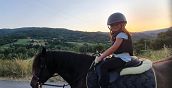 Passeggiata a cavallo nella Val Noveglia tra colline e boschi