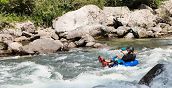 Discesa in river tubing sul Brembo a bordo di una ciambella gonfiabile