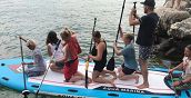 Partecipanti su Mega SUP sul Lago di Garda da Porto Tignale