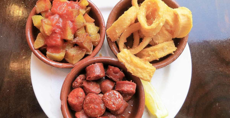 Chorizo calamari e patate a Malaga